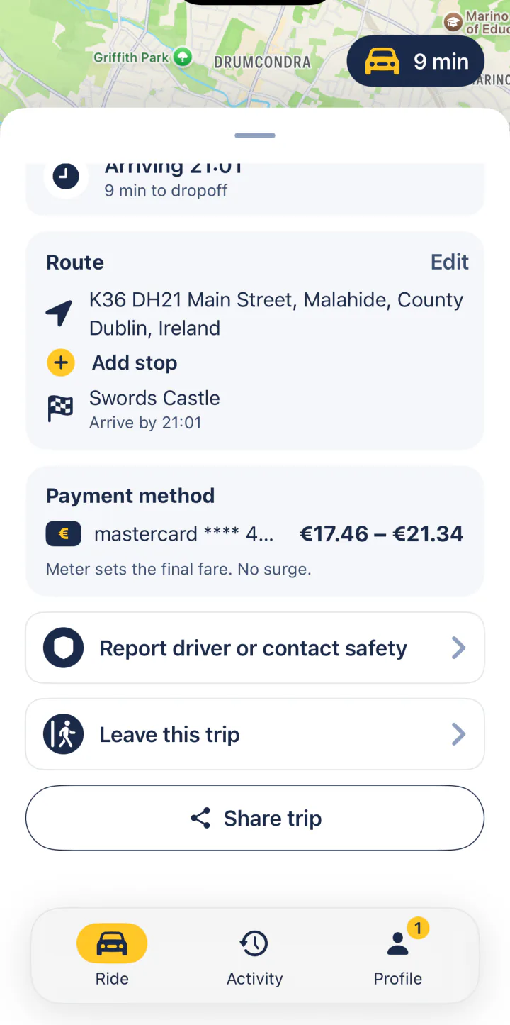 A trip in progress in FairTaxi on iPhone, with Share trip and Report driver or contact safety